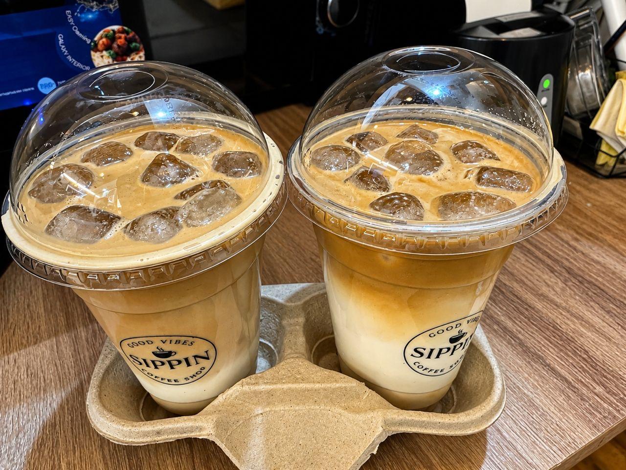 Two iced coffees to go — Sippin Coffee Almaty